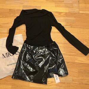New with Tags!
Long sleeve shirt w/leather skirt. 
Size Small